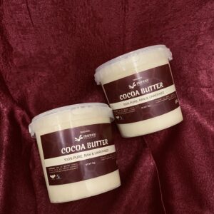 two 1 kg raw unrefined tanzania cocoa butter in small buckets.