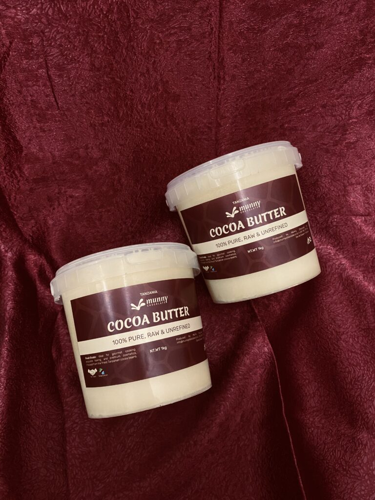 two 1 kg raw unrefined tanzania cocoa butter in small buckets.