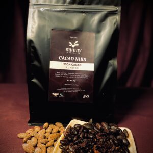 Roasted cacao nibs pouch with wooden plate of nibs Tanzania